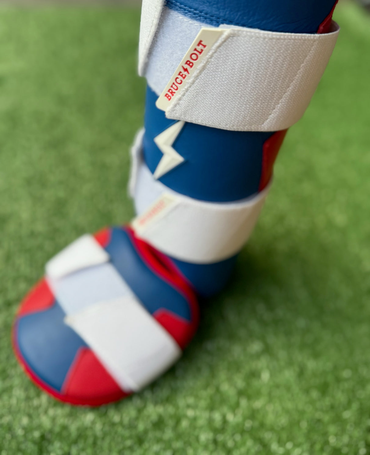 Bruce Bolt Adult Size Leg Guard - Red, White, Blue